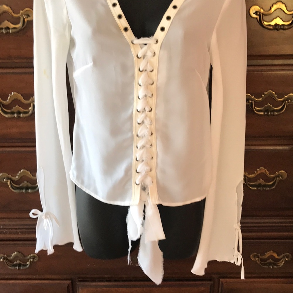 Ladies white v neck long sleeve blouse.